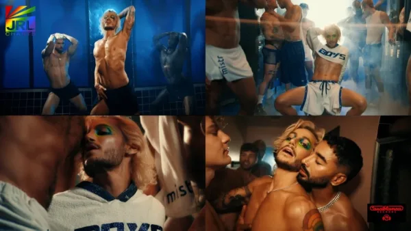 Frankie Grande surrounded by male dancers in a bold, queer-themed gym setting