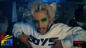 Frankie Grande leading a choreographed dance in a steamy gym scene from the “Boys” music video