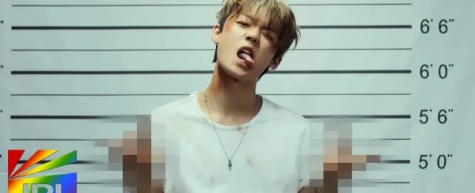 KANG YUCHAN in a black outfit during his Champagne Poppin’ solo debut MV — neon-lit dance scene