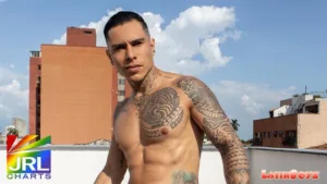 LatinBoyz model Tigre shirtless on rooftop holding soccer ball in Colombian muscle jock debut