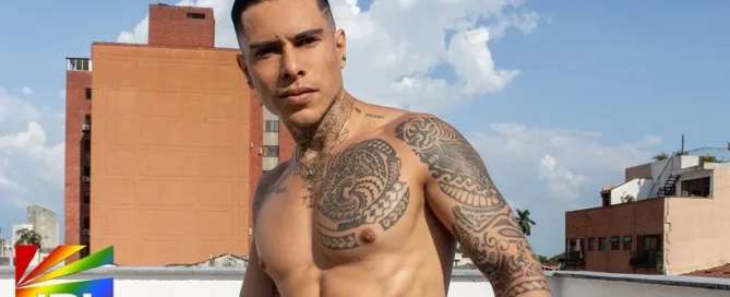 LatinBoyz model Tigre shirtless on rooftop holding soccer ball in Colombian muscle jock debut