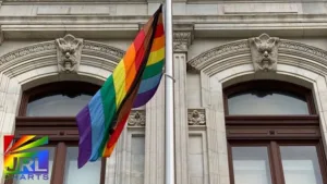 Progress Pride flag flying outside Philadelphia City Hall, symbolizing LGBTQ+ unity and inclusion in local government