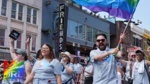 Nashville Pride Festival crowd at Riverfront Park, image via WPLN – Nashville Pride faces $300K funding crisis | JRL CHARTS LGBT Politics
