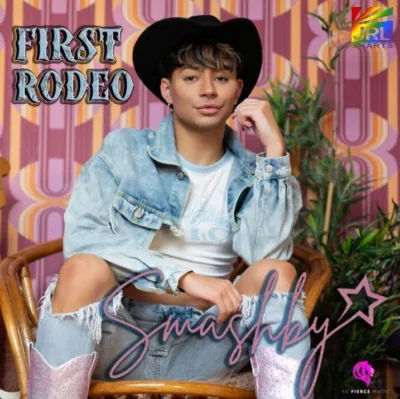 Official poster artwork for Smashby’s “First Rodeo” country-parody music video © So Fierce Music | JRL CHARTS Gay Music News