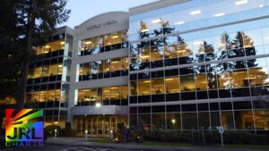 World Vision headquarters with legal scales overlay, symbolizing 9th Circuit Court ruling on LGBTQ hiring rights and ministerial exception – JRL CHARTS