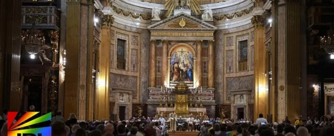 Members of the LGBTQ community attend vigil prayer during the LGBT pilgrimage Mass at the Church of the Gesù in Rome, led by Bishop Francesco Savino.