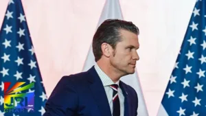 Yahoo News photo of Secretary of Defense Pete Hegseth in Warsaw, Poland on February 14, 2025 — Pentagon coverage on JRL CHARTS LGBT Politics.