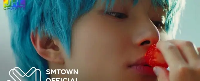 NCT’s Jungwoo poses in colorful teaser image for his solo debut single “SUGAR.”