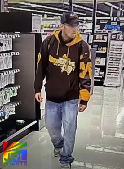 Surveillance still of alleged theft suspect in Meijer sexual wellness section | JRL CHARTS crime alert