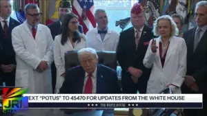 President Donald Trump signs executive order reclassifying marijuana as a Schedule III drug during White House announcement.