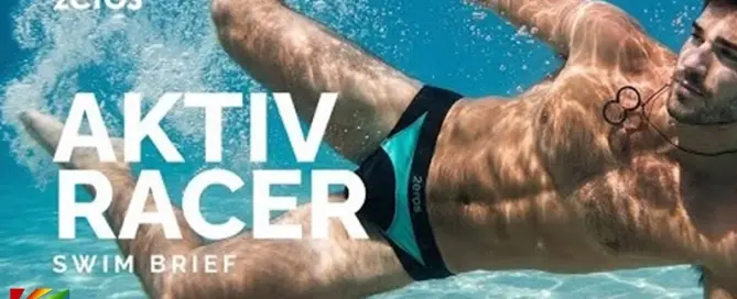 Male model wearing 2EROS AKTIV Racer performance swim briefs underwater in official swimwear commercial campaign