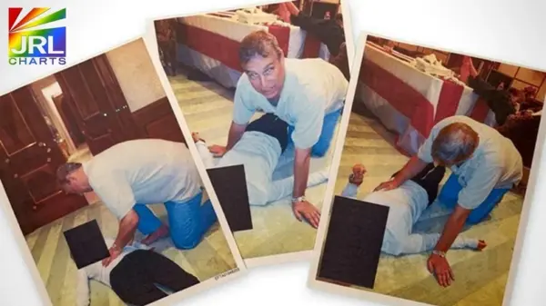 Undated photo released by the U.S. Department of Justice showing Prince Andrew leaning over an unidentified person as part of Epstein Files disclosure.