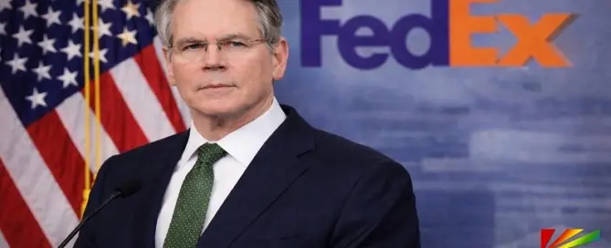 U.S. Treasury Secretary Scott Bessent speaking at podium with American flag and FedEx logo background
