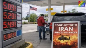 man pumping gas as prices exceed 5 dollars amid Iran conflict economic impact in the United States