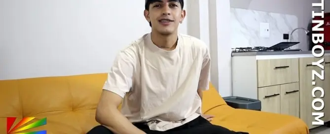 Teo LatinBoyz Colombian model sitting on couch during newcomer introduction