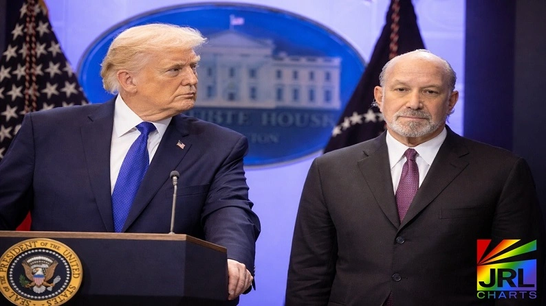 Donald Trump stands at podium beside Howard Lutnick in the White House during cabinet shake-up discussions in 2026