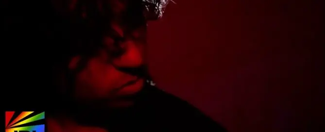 David Lee in cinematic red lighting portrait for ALL OF YOUR GIRLS single release
