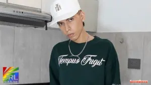 LatinBoyz newcomer Julian Colombian model posing in casual streetwear for LGBTQ digital entertainment feature