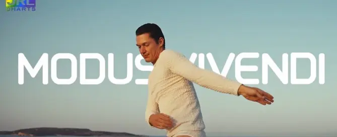 Male dancer wearing MODUS VIVENDI Ballet Line underwear performing mid-air ballet pose against sky background