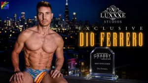 Dio Ferrero posing with his Grabbys America 2026 Best Newcomer Award as a Luxxxe Studios exclusive performer