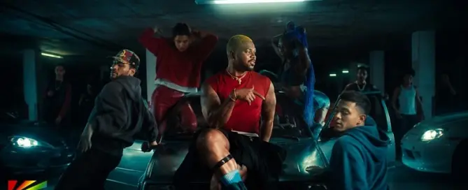 MNEK performs with dancers in a cinematic underground parking garage scene from the REVERSE!! official music video.