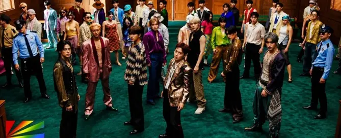 ATEEZ members appear in a dramatic courtroom scene from the BAD Official Music Video, which surpassed 35 million YouTube views following the release of GOLDEN HOUR Part.5.