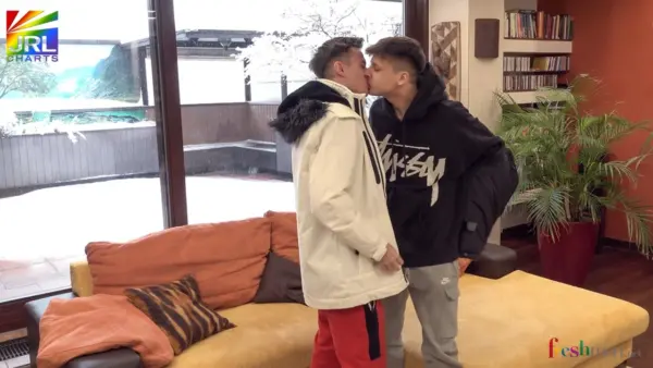 Hollywood-style portrait of Josh Mendes and Lincoln Carrel sharing a romantic winter moment for Freshmen.net.