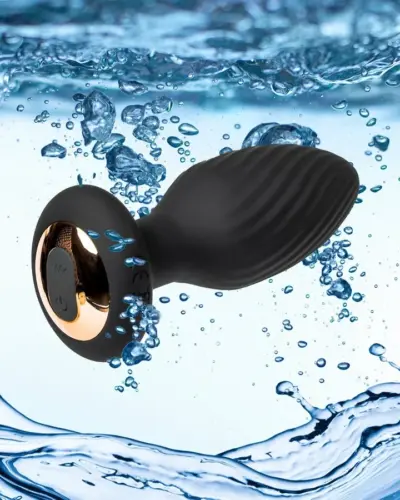 The Spin Rotating Anal Plug by Our Erotic Journey displayed underwater, highlighting its IPX7 waterproof design and premium medical-grade silicone construction.