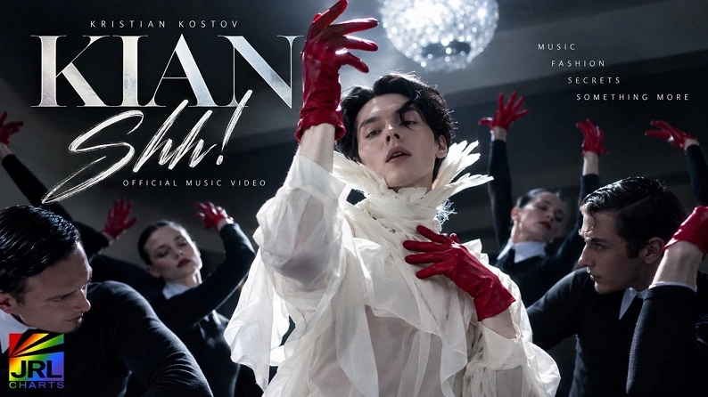 KIAN, the stage name of Kristian Kostov, in the Shh! official music video surrounded by dancers in dramatic high-fashion styling.