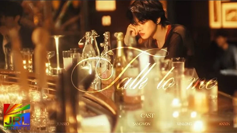 ALPHA DRIVE ONE Talk to me official music video artwork featuring cinematic golden lighting and the song title.